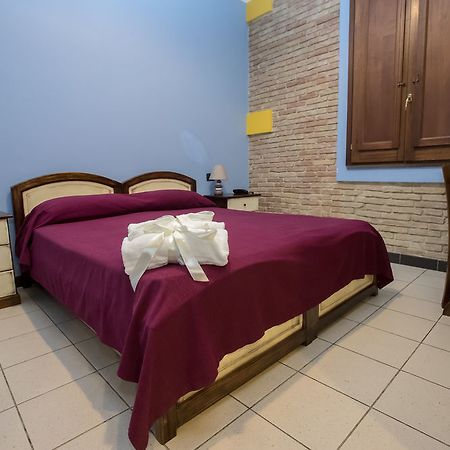 Arcobaleno Rooms กาญารี ภายนอก รูปภาพ