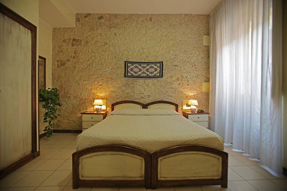 Arcobaleno Rooms กาญารี ภายนอก รูปภาพ
