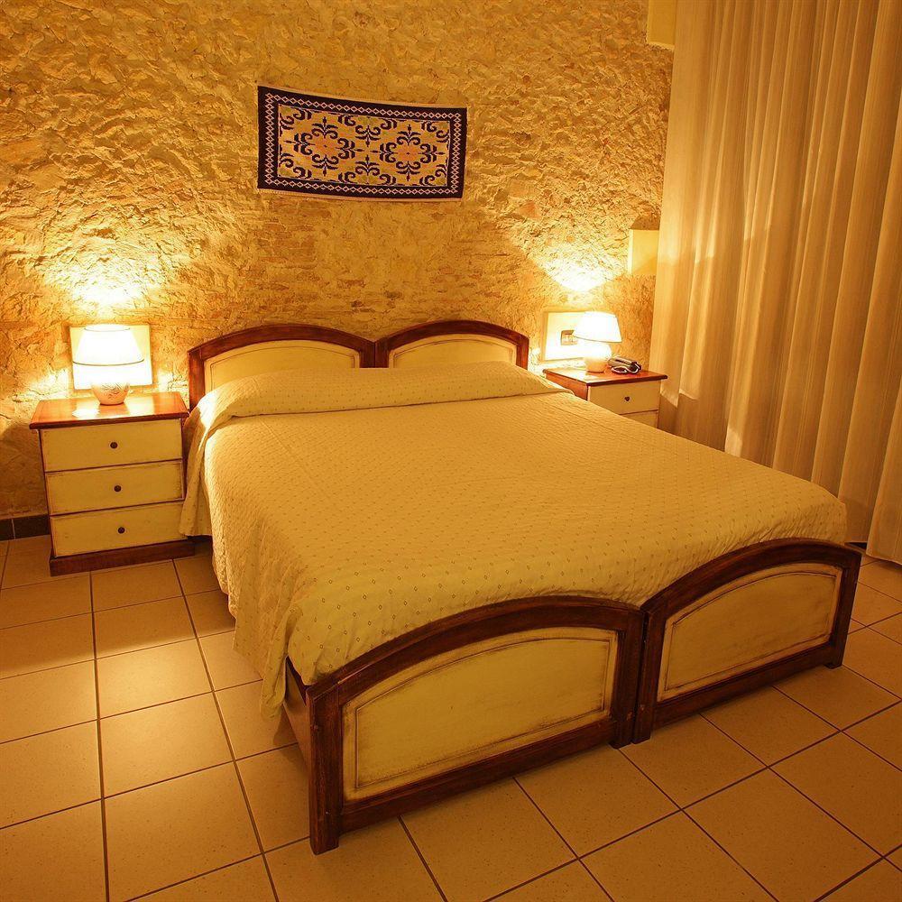 Arcobaleno Rooms กาญารี ภายนอก รูปภาพ