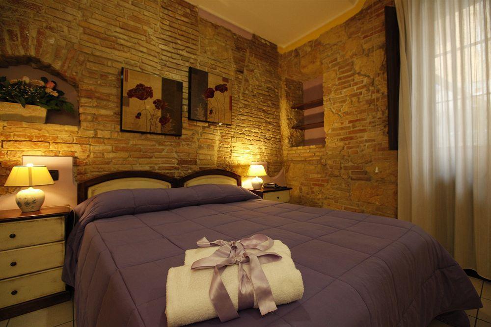 Arcobaleno Rooms กาญารี ภายนอก รูปภาพ