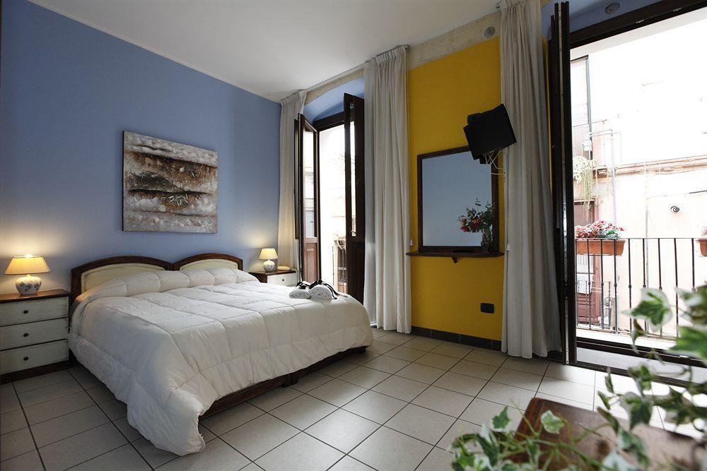 Arcobaleno Rooms กาญารี ภายนอก รูปภาพ