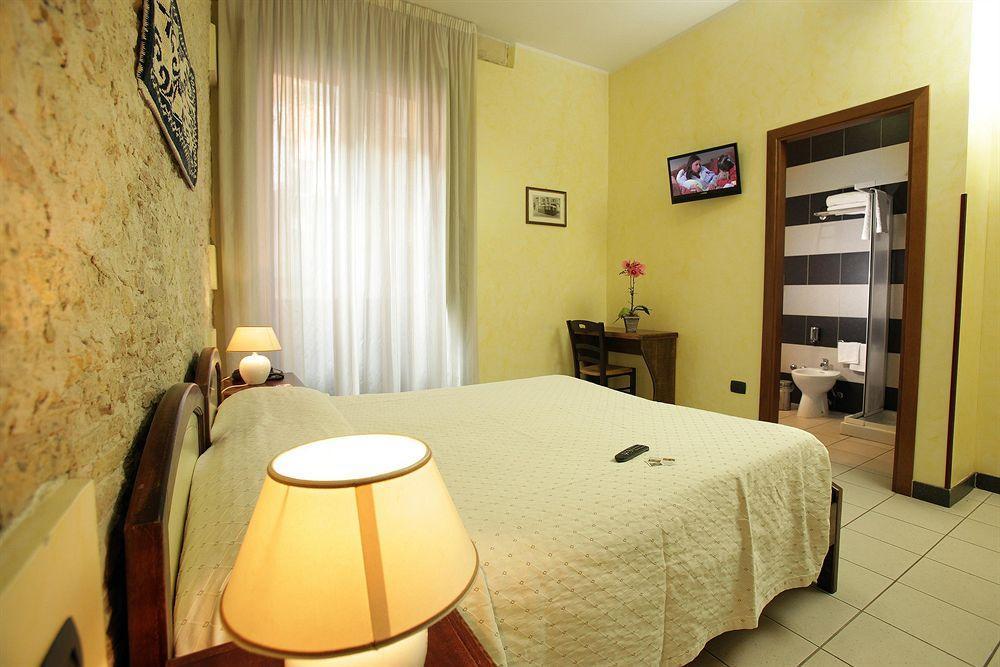Arcobaleno Rooms กาญารี ภายนอก รูปภาพ