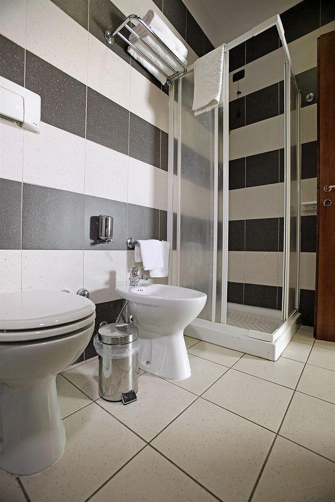 Arcobaleno Rooms กาญารี ภายนอก รูปภาพ