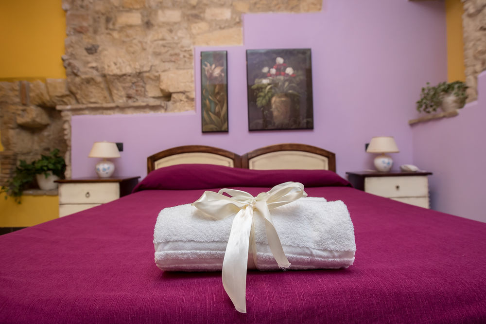 Arcobaleno Rooms กาญารี ภายนอก รูปภาพ