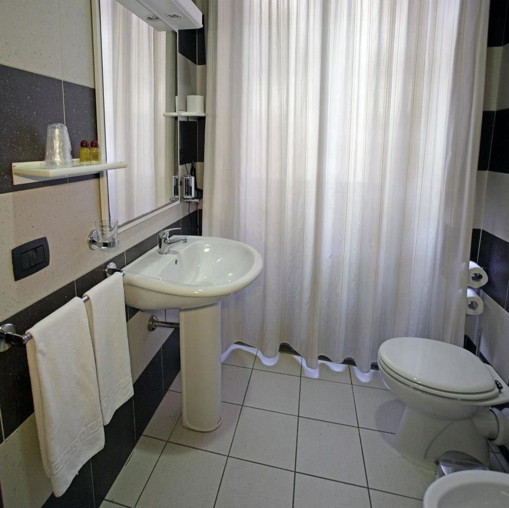 Arcobaleno Rooms กาญารี ภายนอก รูปภาพ